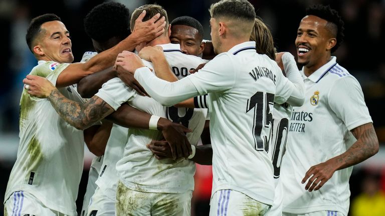 Real Madrid players celebrate after teammate Toni Kroos scored their side's second goal during Spanish La Liga soccer match between Real Madrid and Cadiz CF at Santiago Bernabeu stadium in Madrid, Thursday, Nov. 10, 2022. (AP Photo/Manu Fernandez)